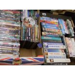 A large collection of DVDs and Videos (2 trays)