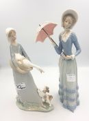 Two Lladro figures lady with a goose and a lady with a parasol (2).