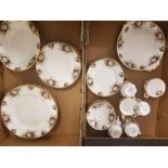 A collection of Royal Albert 'Celebration' tea and dinner ware items to include 6 tea trio's and a