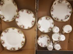 A collection of Royal Albert 'Celebration' tea and dinner ware items to include 6 tea trio's and a