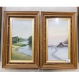 Two early 20th century framed and glazed oil paintings of landscape scenes 51cm x 32.5cm (2).