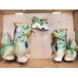 A group of 3 reproduction stoneware Dogs of Fu.