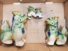 A group of 3 reproduction stoneware Dogs of Fu.