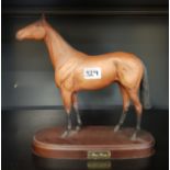 Royal Doulton 'Red Rum' racehorse on wooden plinth