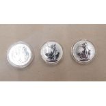 A group of 3 One Ounce Britannia Silver Coins dated 1998, 2006 and 2008