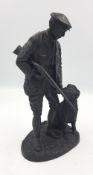 A Heredities bronzed Figure of Gamekeeper and gun dog.