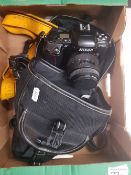 Nikon F-601 SLR film camera with 35-80mm 1.4 - 5.6 lens and soft carry case.