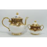 De Lamerie Fine Bone China heavily gilded Burgundy Aphrodite patterned tea pot & sugar bowl,