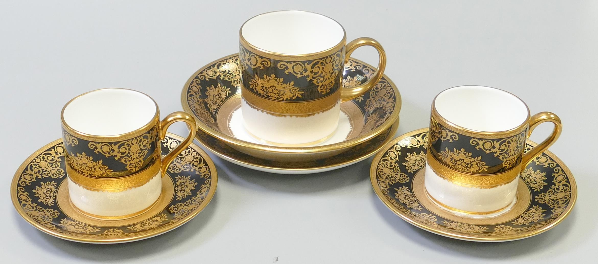 De Lamerie Fine Bone China heavily gilded Black Exotic Garden patterned cup & saucer sets & small