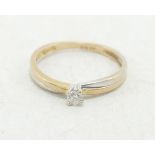 9ct gold ladies solitaire diamond ring, size M, 1.4g.