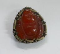 Chinese carved red hardstone buddha mounted in clip. Carved in agate, carnelian or similar very hard