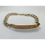 9ct hallmarked gold ID bracelet of hollow construction, engraved with name & date, with denting to