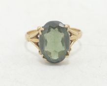 9ct gold ladies dress ring set with large oval green stone, 3g.