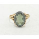 9ct gold ladies dress ring set with large oval green stone, 3g.