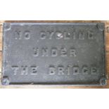 Original cast iron No Cycling Under The Bridge railway sign, 29 x 48cm.