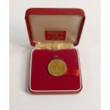 Full gold sovereign dated 1958 mounted in 9ct gold mount, 8.6g.