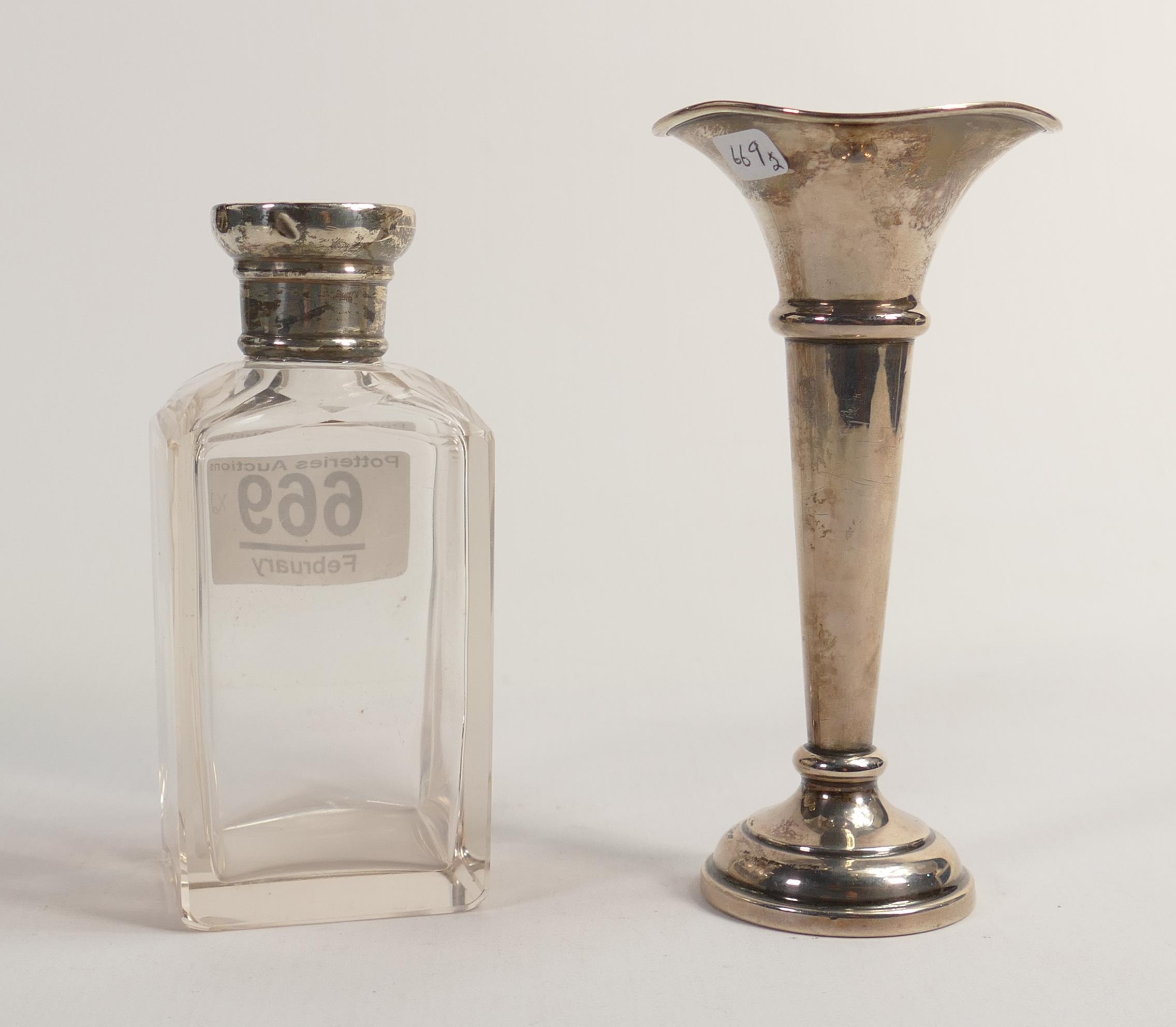 Nice quality silver topped dressing table bottle, clear hallmarks for London 1910. Screw top in