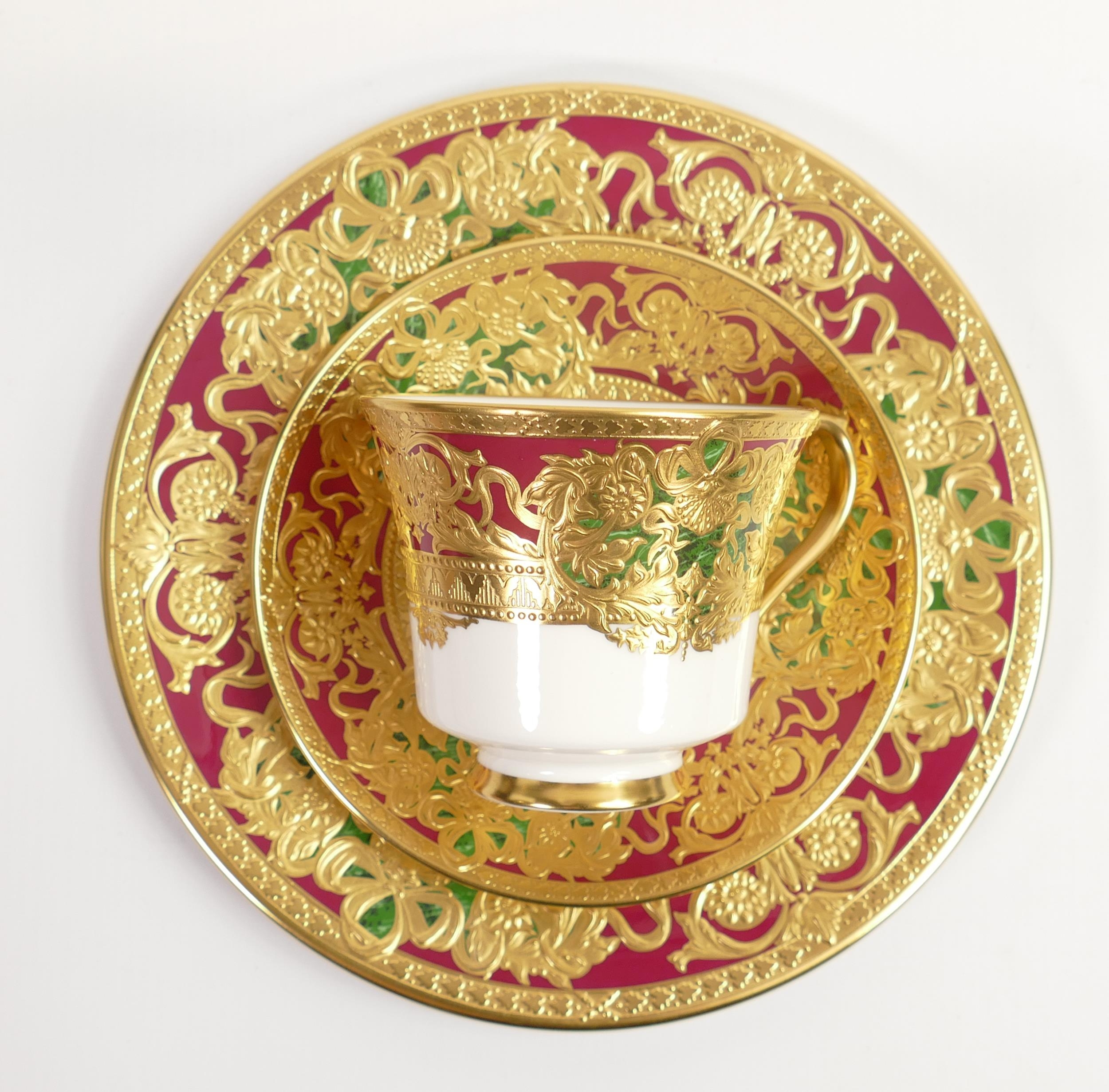 De Lamerie Fine Bone China heavily gilded Royal Bow cup and saucers, specially made high end quality