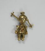 9ct gold gem set articulated doll pendant, hallmarked, weight 2.6g.