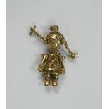 9ct gold gem set articulated doll pendant, hallmarked, weight 2.6g.