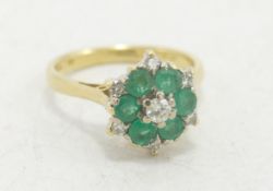 18ct gold ladies emerald and diamond cluster ring, size I, 3.6g.