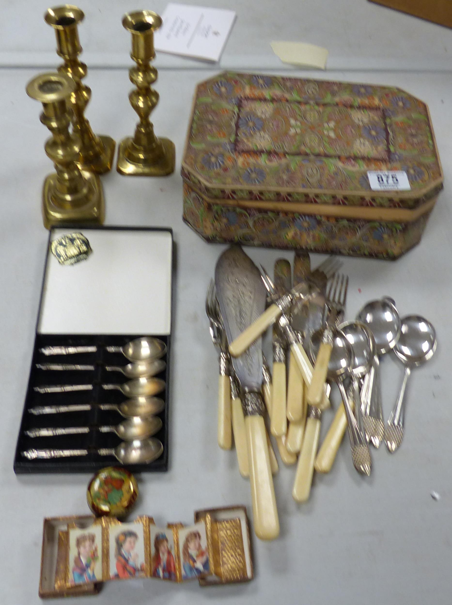 A mixed collection of items to include decorative Huntley Palmer tin box, silver plated cutlery &