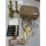 A mixed collection of items to include decorative Huntley Palmer tin box, silver plated cutlery &