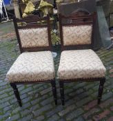 Early 20th century pair of oak upholstered dining chairs (2).
