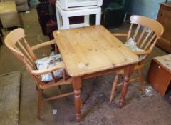 Farmhouse pine tea table with 2 carver chairs.