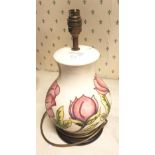Moorcroft Pink Magnolia on cream ground large table lamp, 35cm in height overall.