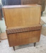 Mid Century Modern teak bureau with fall front and storage below, 76cm in width x 109cm in height.