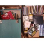 A collection of singles vinyl records together with music CD's and blank VHS tapes etc (2 trays).