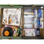 A mixed collection of items to include vintage LP's, singles and a large collection of VHS cassettes