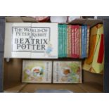 A collection of Beatrix Potter Related books, some boxed