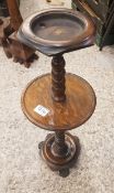 Late 19th century oak smokers stand, bobbin turned details, sitting on brass lions paw feet, 64cm in