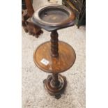 Late 19th century oak smokers stand, bobbin turned details, sitting on brass lions paw feet, 64cm in