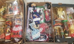 A large collection of vintage global souvenir type collectable dolls (3 trays).