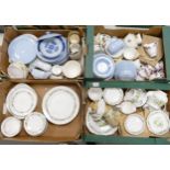 A large collection of floral tea and dinner ware