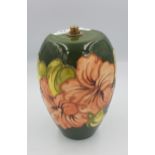 Moorcroft hibiscus on green ground table lamp body (no fittings or cable etc), 20cm in height.