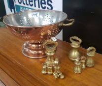 Copper colander, together with a set of imperial graduated weighing scale weights and a similar