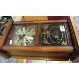 Reproduction 'Highlands' 31 day wall clock, key and pendulum present.
