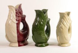 Wade graduated Gluggle jugs, tallest height 26.5cm. These items were removed from the archives of