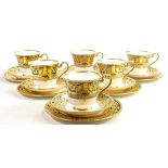 De Lamerie Fine Bone China heavily gilded Empress patterned set of six trios, specially made high