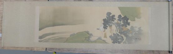 Oriental scroll depicting man at the foot of a waterfall.