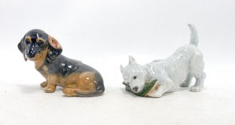 Royal Copenhagen model of a terrier with slipper 145 and seated Dachshund 3140. (2)