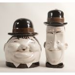 Pair of Flesh pot jar & covers as Laurel & Hardy, c1980s, tallest h.24cm. (2)