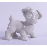 Wade white glazed unmarked Disney Tramp Figure, height 10cm. This was removed from the archives of