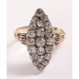 Impressive antique oval 21 diamond cluster ring, gold shank tests as high carat. Old cut diamonds,