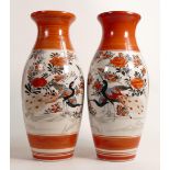Pair of 20th century Japanese Satsuma patterned vases, height 30cm. (2)