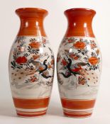 Pair of 20th century Japanese Satsuma patterned vases, height 30cm. (2)